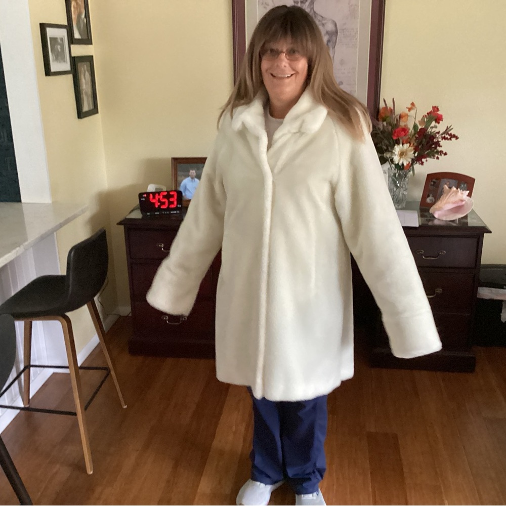 Elegant White Faux Fur Coat by the European brand Madame
